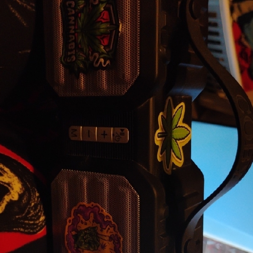 Black Portable Speaker with Stickers
